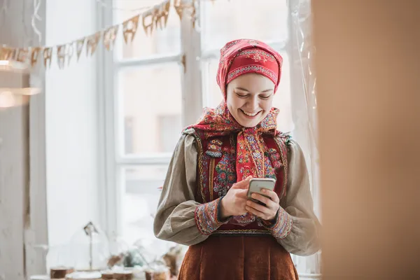 A woman in a luxurious green gown next to an ornate roulette wheel, capturing the upscale casino mood of KK3333.